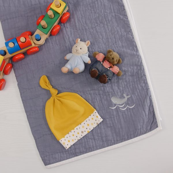 Baby Beanie on baby blanket