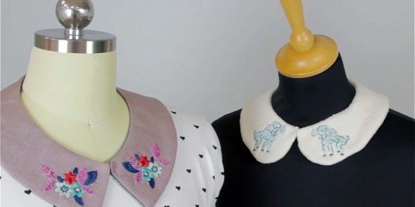 2 female dress forms with embroidered cutesie collar