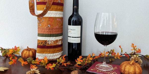 Wine Carrier by Pat Bravo