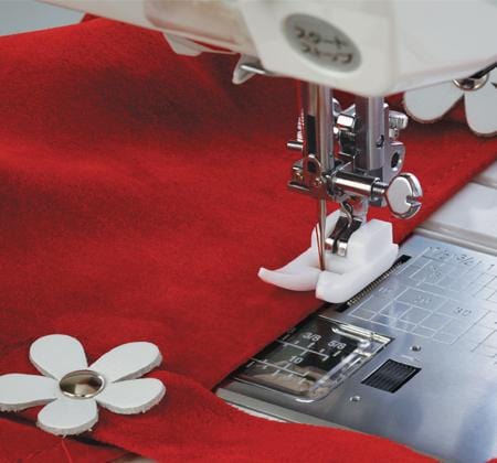 Shop High-Quality Sewing Machines and Equipment at Stitchin' Heaven